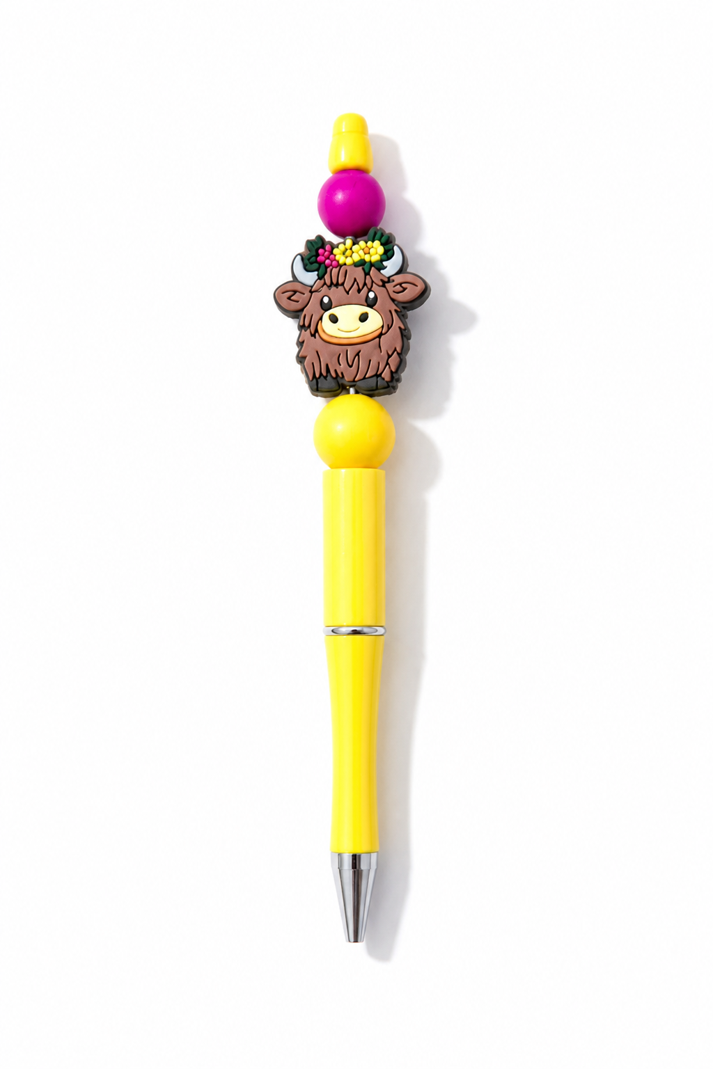 Highland Cow Beaded Pens in everyday writing use
