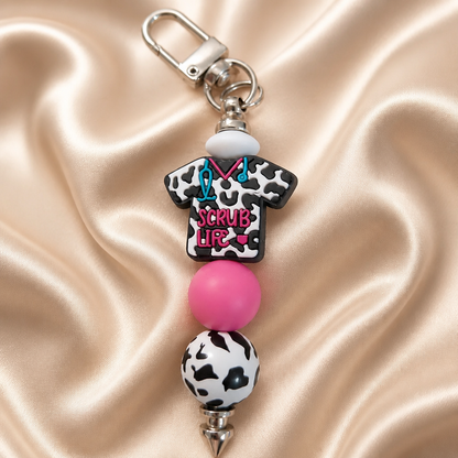 Close-up of a Hospital Keyring featuring a scrub shirt design, perfect for healthcare professionals and medical students.